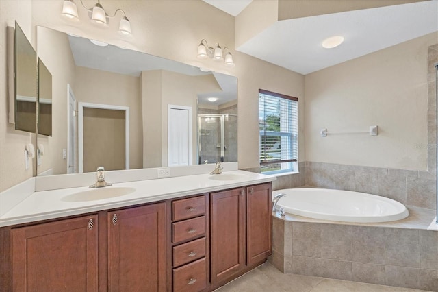 full bath featuring a bath, a shower stall, double vanity, and a sink