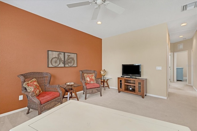 living area featuring carpet, visible vents, and baseboards