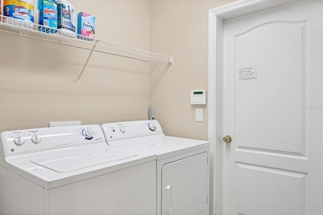 laundry room featuring laundry area and independent washer and dryer