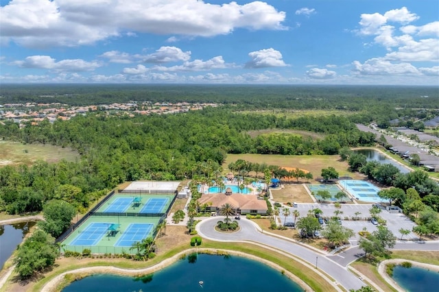 bird's eye view featuring a water view and a wooded view