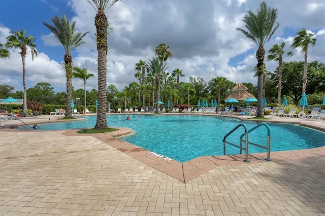 community pool with a patio