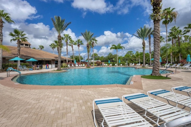 community pool featuring a patio area