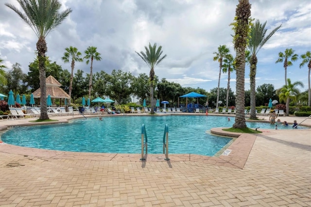 community pool featuring a patio area and a gazebo