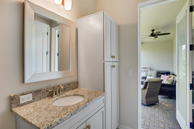 bathroom with vanity and ceiling fan