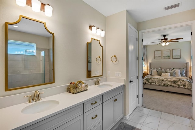 bathroom featuring vanity and ceiling fan