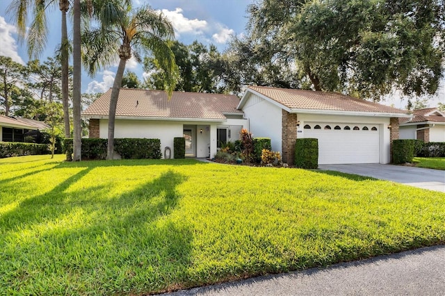 ranch-style house with a front lawn and a garage