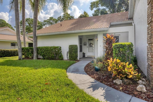 view of front of house with a front lawn