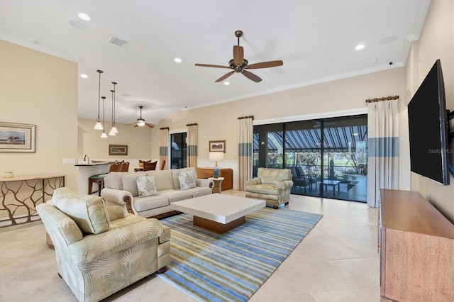 living room featuring ceiling fan, crown molding, and light tile patterned floors