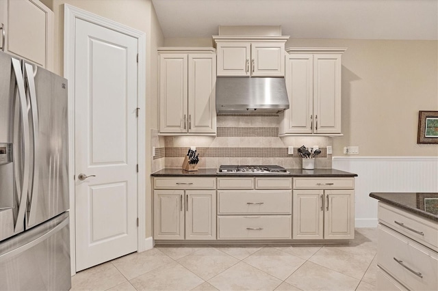 kitchen featuring light tile patterned floors and appliances with stainless steel finishes