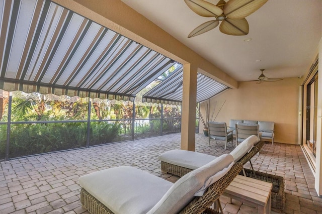 view of patio featuring ceiling fan