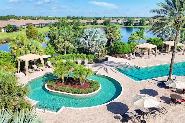 view of swimming pool featuring a patio area and a gazebo