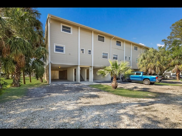 view of front of house featuring a carport