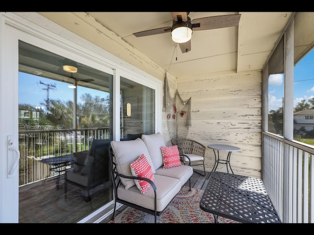 exterior space with ceiling fan