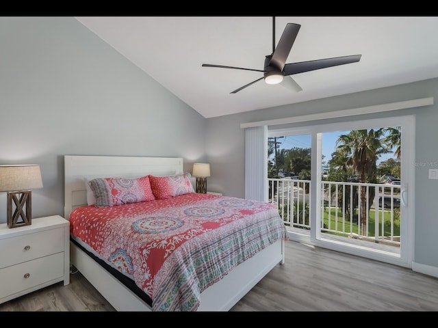 bedroom featuring ceiling fan, access to outside, light hardwood / wood-style flooring, and lofted ceiling