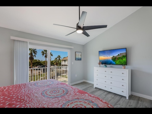 bedroom featuring ceiling fan, vaulted ceiling, access to outside, and light wood-type flooring