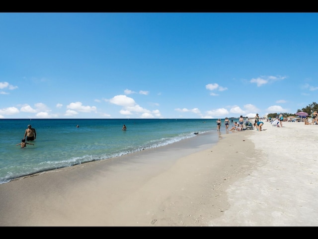 property view of water with a beach view