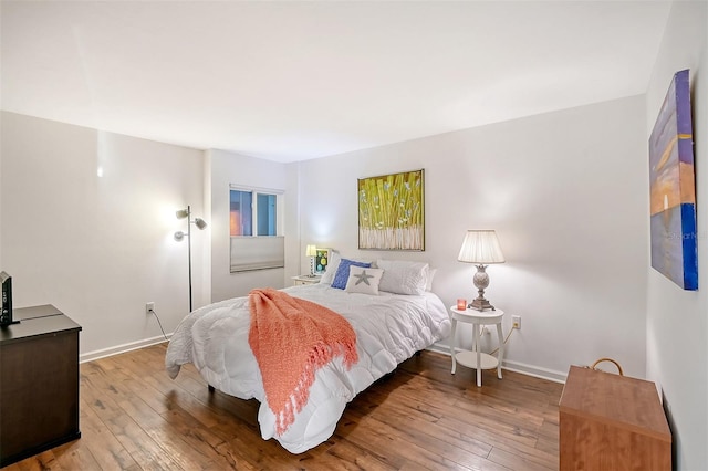 bedroom featuring hardwood / wood-style floors