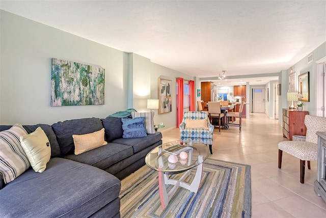 living room with light tile patterned floors