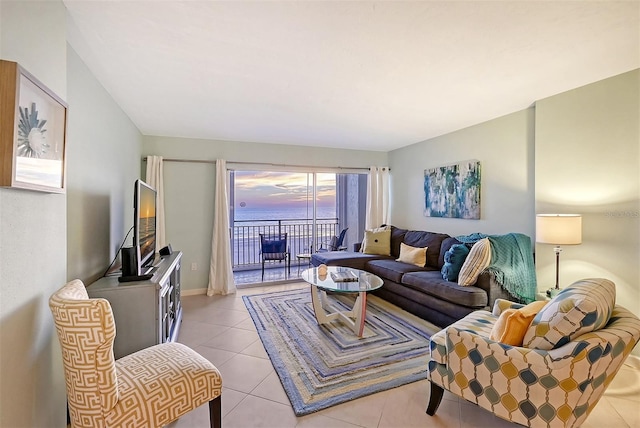 living room featuring light tile patterned flooring