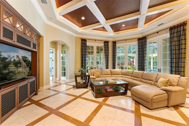 tiled living room with coffered ceiling, french doors, beamed ceiling, and ornamental molding