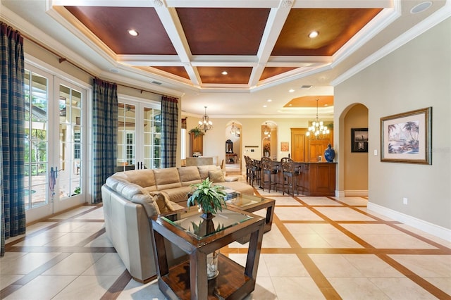 living area with crown molding, recessed lighting, an inviting chandelier, and baseboards