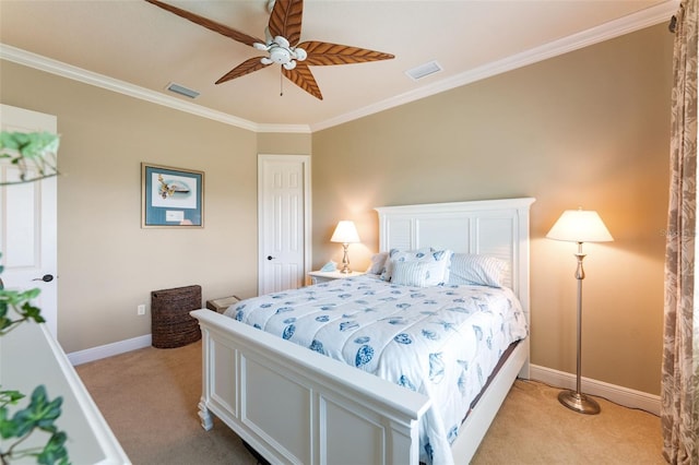 bedroom with ceiling fan, light carpet, and ornamental molding