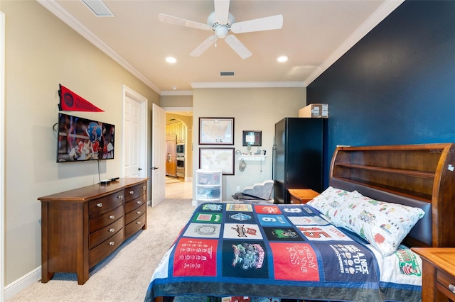 bedroom featuring arched walkways, light colored carpet, visible vents, ornamental molding, and baseboards