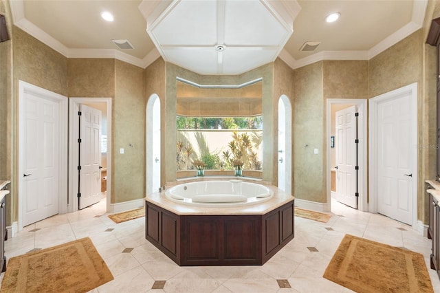 bathroom featuring a tub to relax in, tile patterned flooring, and ornamental molding