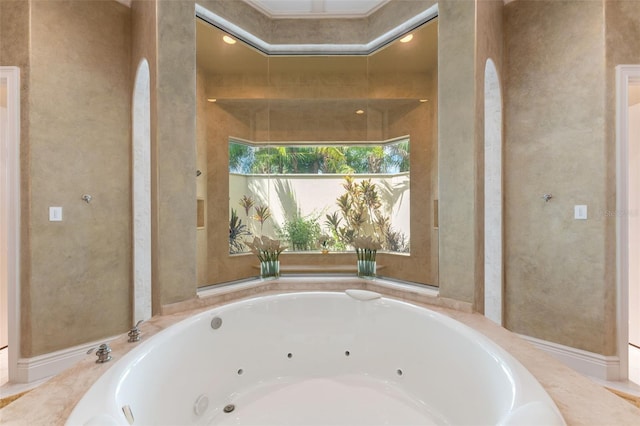 bathroom featuring a jetted tub