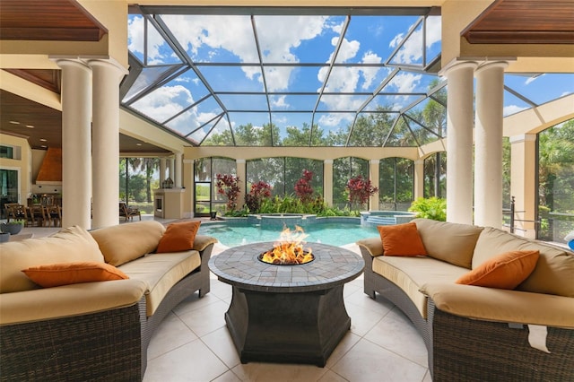 sunroom / solarium featuring ornate columns