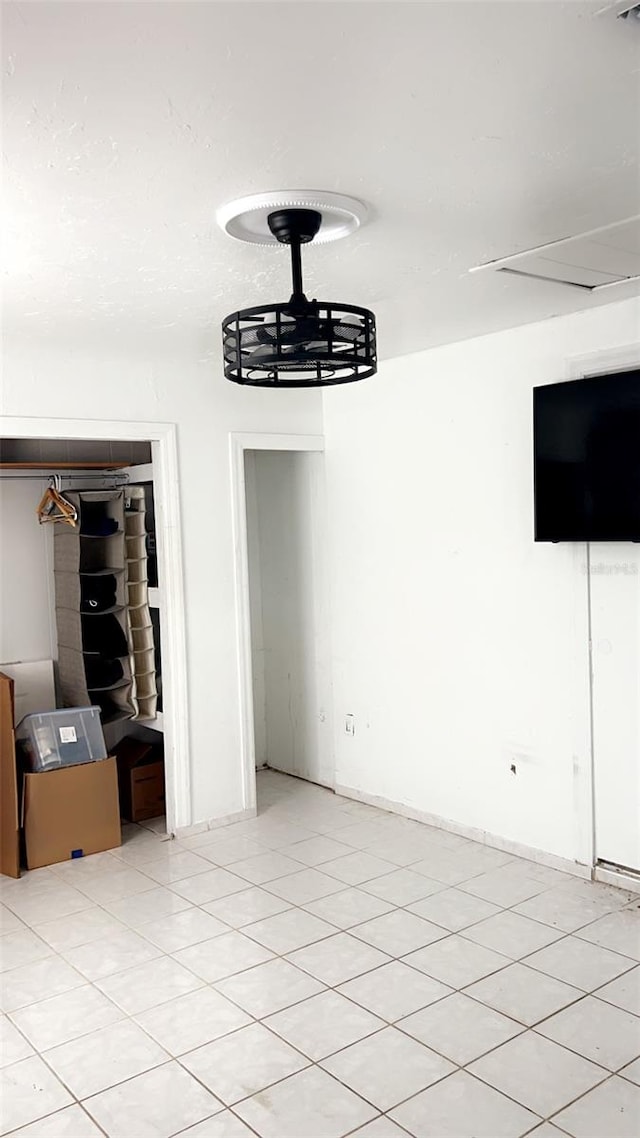 interior space featuring light tile patterned flooring