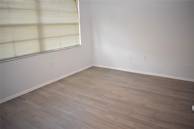 empty room featuring hardwood / wood-style floors