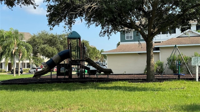 view of playground with a yard