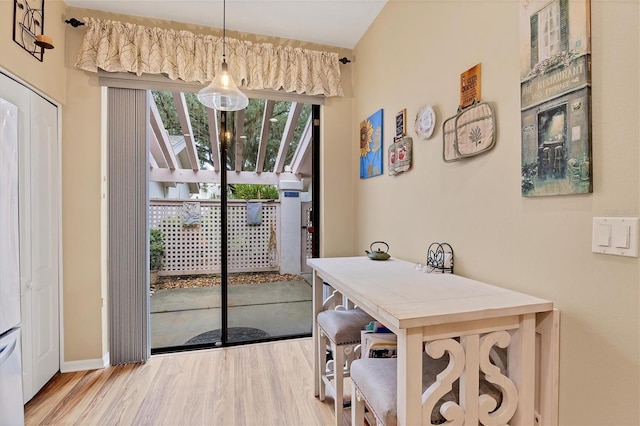 dining room with light wood-type flooring