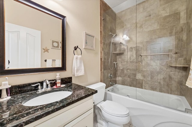 full bathroom featuring vanity, toilet, and bath / shower combo with glass door