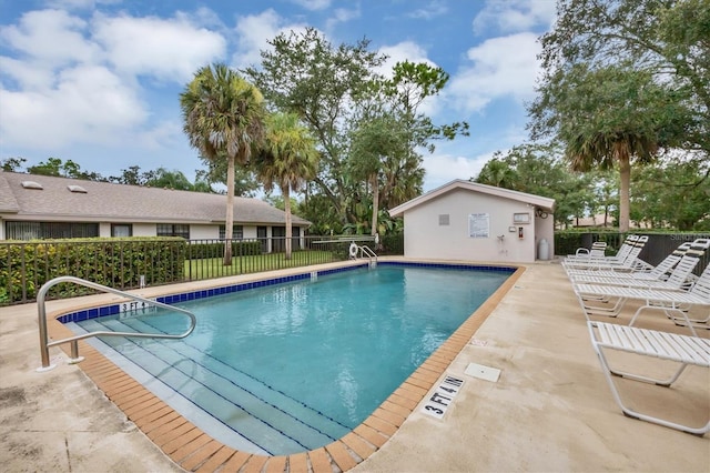 view of pool featuring a patio