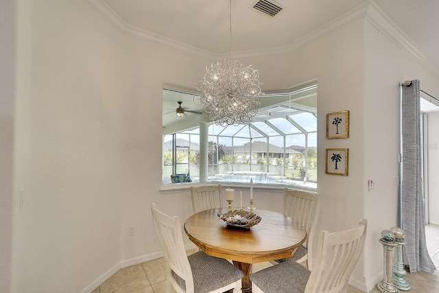 dining space with light tile patterned floors, visible vents, baseboards, ornamental molding, and ceiling fan with notable chandelier