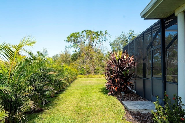 15923 29th St E, Parrish, FL 34219 - view of grassy yard with a lanai