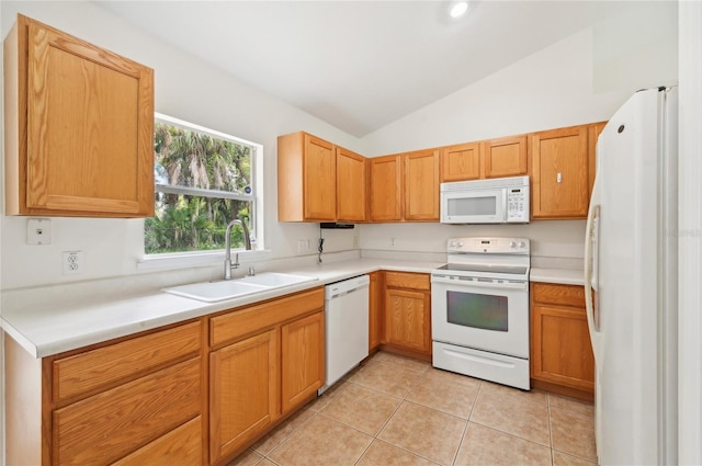 kitchen featuring light tile patterned flooring, white appliances, sink, and lofted ceiling