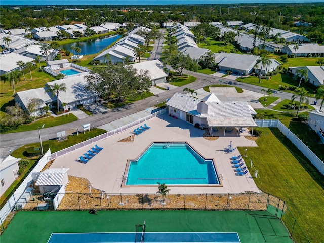 bird's eye view with a water view