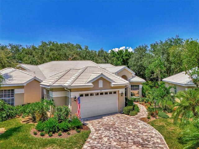 ranch-style home with a garage