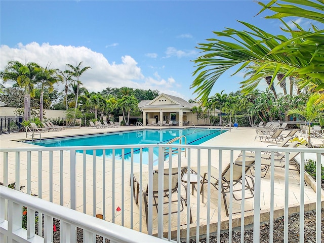 view of swimming pool with a patio area