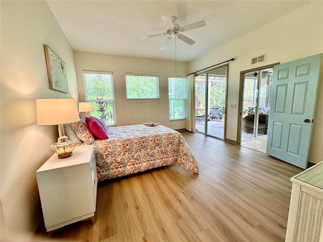 bedroom featuring access to outside, ceiling fan, and hardwood / wood-style floors