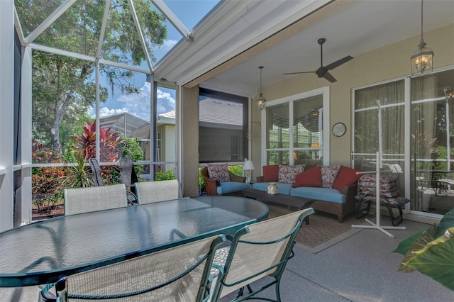 sunroom / solarium with ceiling fan