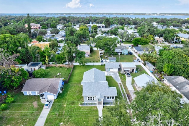 drone / aerial view with a water view