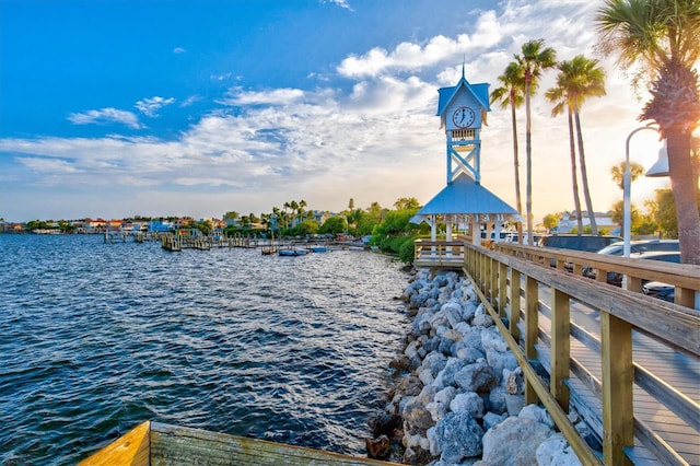 dock area with a water view and a gazebo