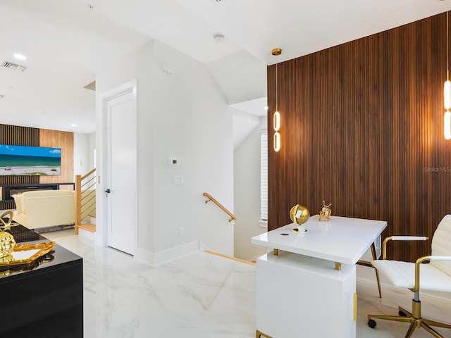 interior space featuring recessed lighting, wood walls, visible vents, baseboards, and marble finish floor