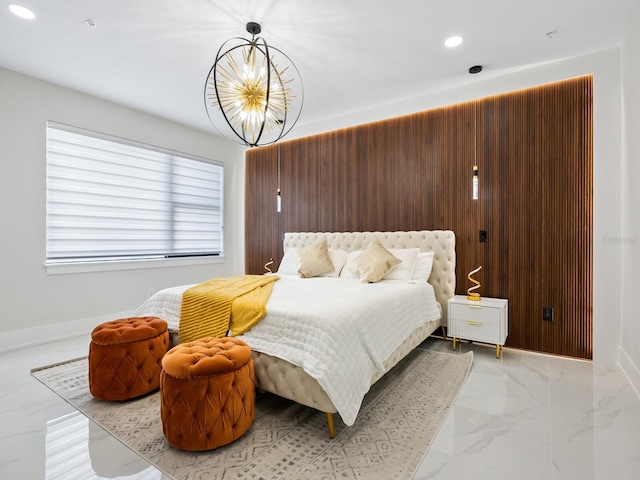 bedroom featuring recessed lighting, wood walls, baseboards, marble finish floor, and an inviting chandelier