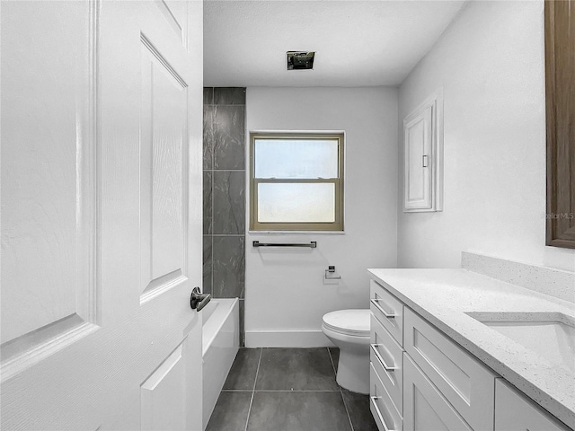 full bathroom featuring toilet, washtub / shower combination, tile patterned flooring, and vanity