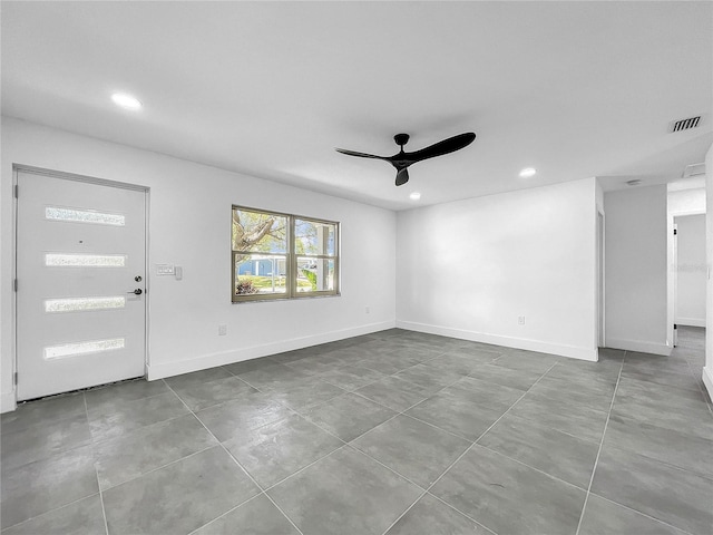 interior space featuring ceiling fan